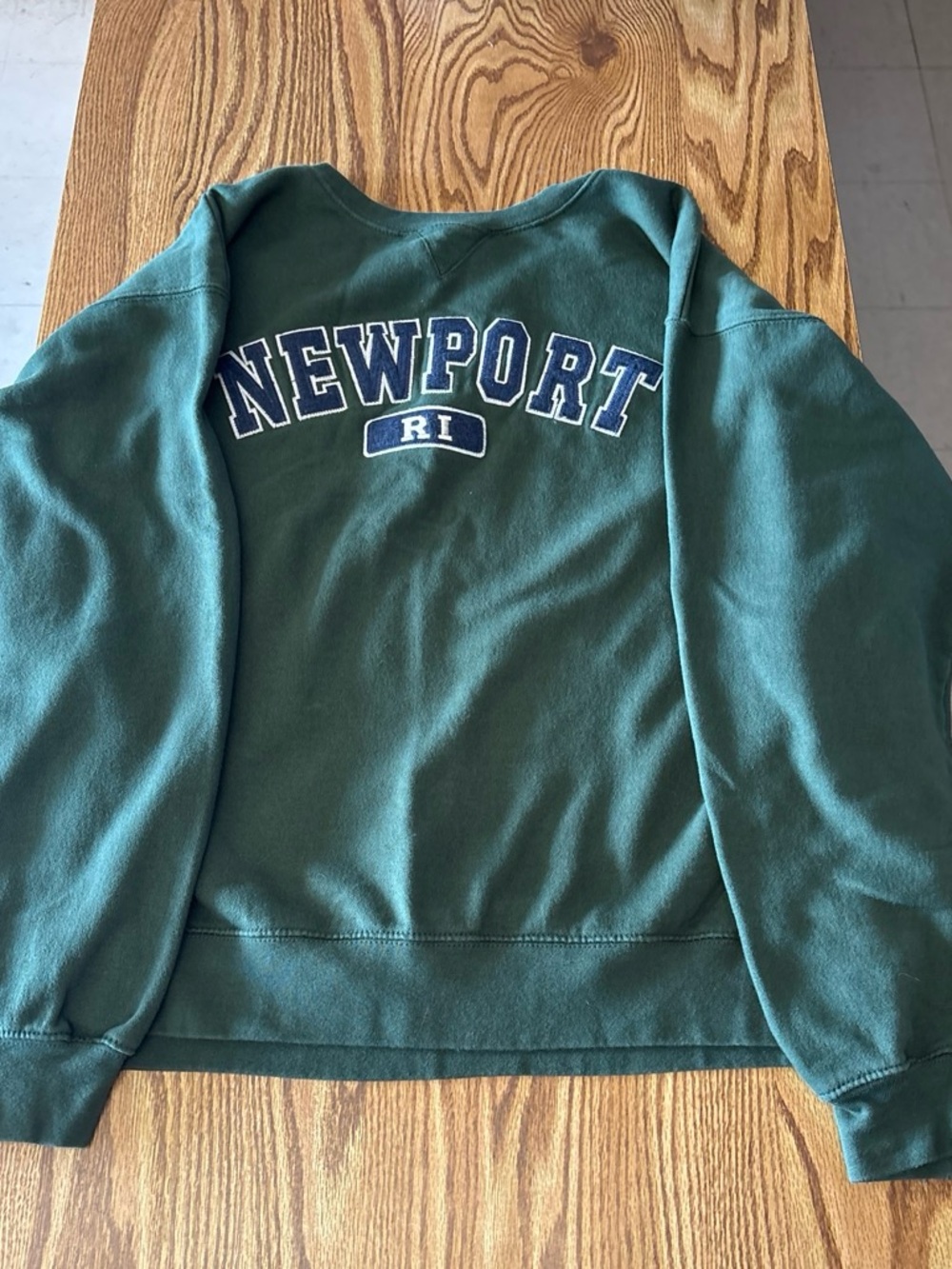 Newport Dark Green Crewneck Sweatshirt with White and Navy Lettering